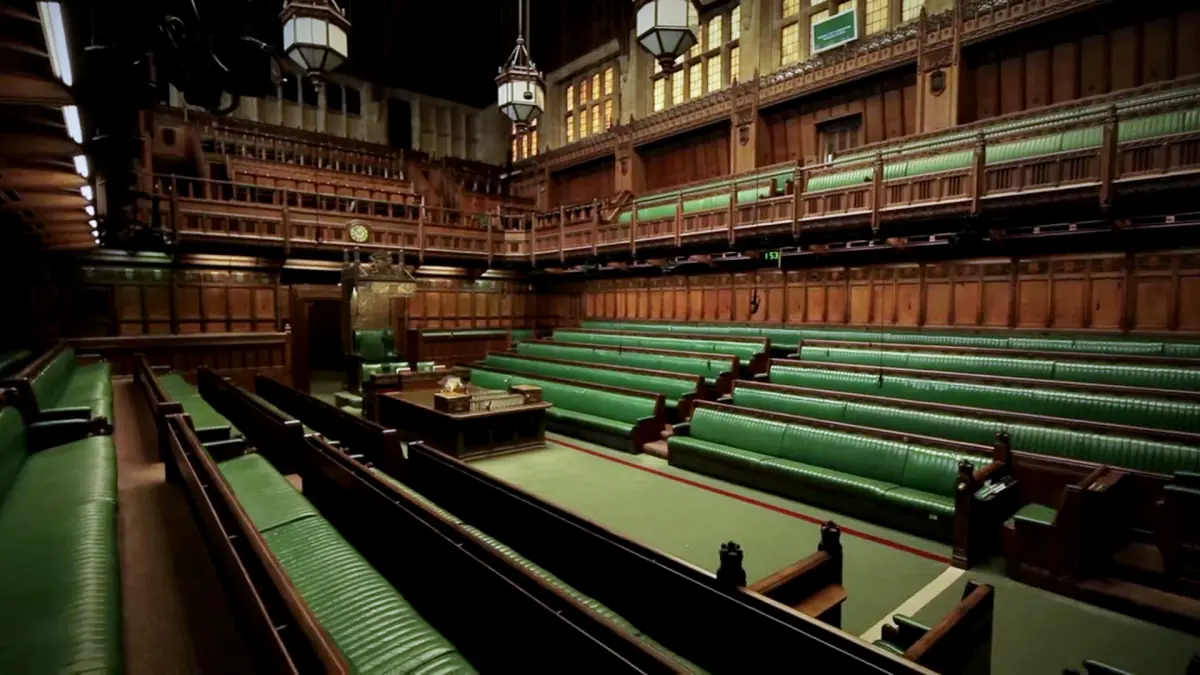 The House of Commons chamber with its green benches